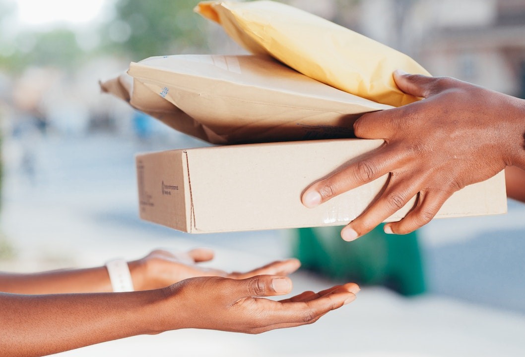 courier handing over parcels